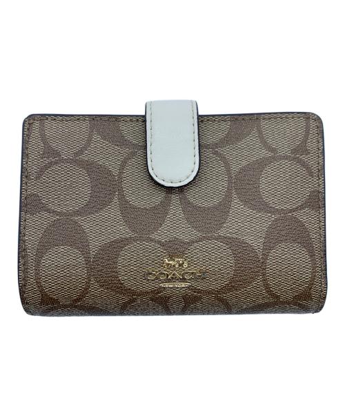 COACH（コーチ）COACH (コーチ) 2つ折り財布 ベージュの古着・服飾アイテム