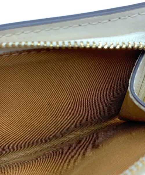 COACH（コーチ）COACH (コーチ) 2つ折り財布 ベージュの古着・服飾アイテム