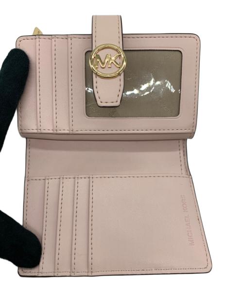 MICHAEL KORS（マイケル・コース）MICHAEL KORS (マイケル・コース) 2つ折り財布 ピンク×ホワイトの古着・服飾アイテム