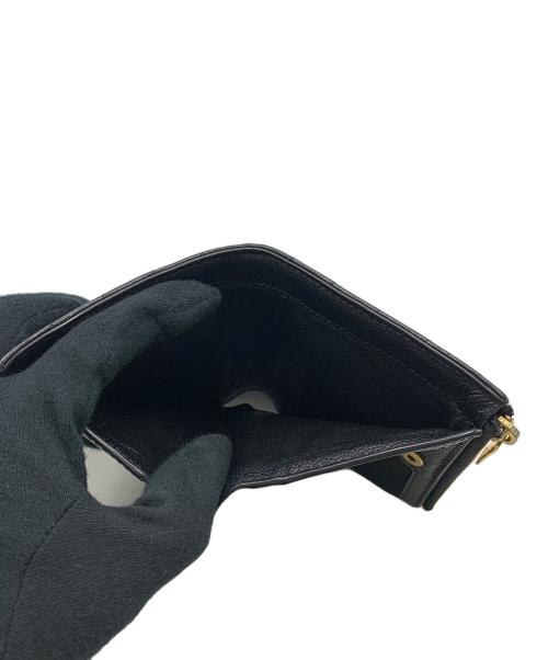 Saint Laurent Paris（サンローランパリ）Saint Laurent Paris (サンローランパリ) 2つ折り財布 ブラックの古着・服飾アイテム