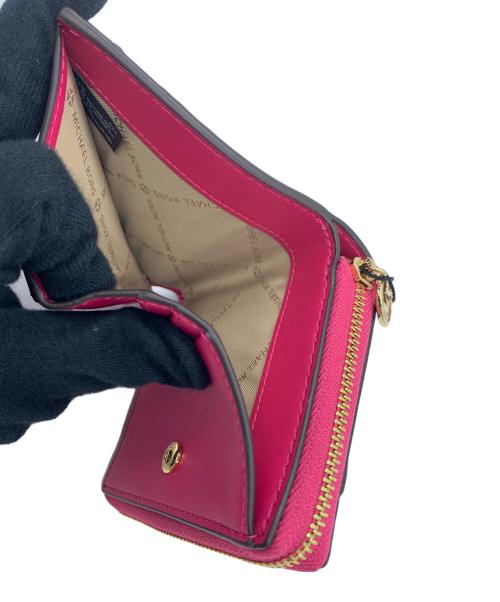 MICHAEL KORS（マイケル・コース）MICHAEL KORS (マイケル・コース) 2つ折り財布 ピンク 未使用品の古着・服飾アイテム