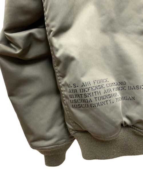 AVIREX（アヴィレックス）AVIREX (アヴィレックス) ステンシルジャケット カーキ×オレンジ サイズ:Lの古着・服飾アイテム