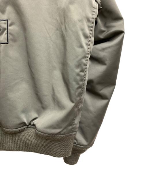 AVIREX（アヴィレックス）AVIREX (アヴィレックス) ステンシルジャケット カーキ×オレンジ サイズ:Lの古着・服飾アイテム