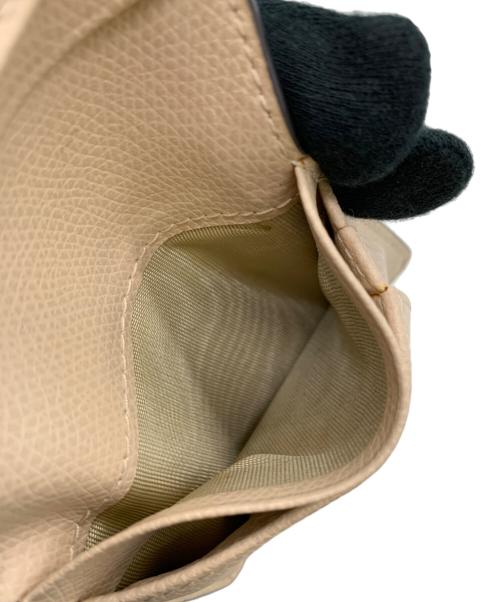 FURLA（フルラ）FURLA (フルラ) 2つ折り財布 ベージュの古着・服飾アイテム