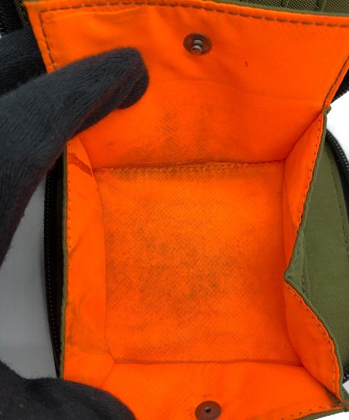 DIESEL（ディーゼル）DIESEL (ディーゼル) 2つ折り財布 カーキ×オレンジの古着・服飾アイテム