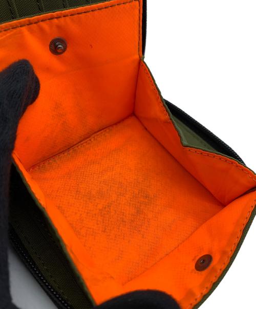 DIESEL（ディーゼル）DIESEL (ディーゼル) 2つ折り財布 カーキ×オレンジの古着・服飾アイテム