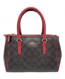 COACH（コーチ）の古着「ハンドバッグ」｜ブラウン×レッド