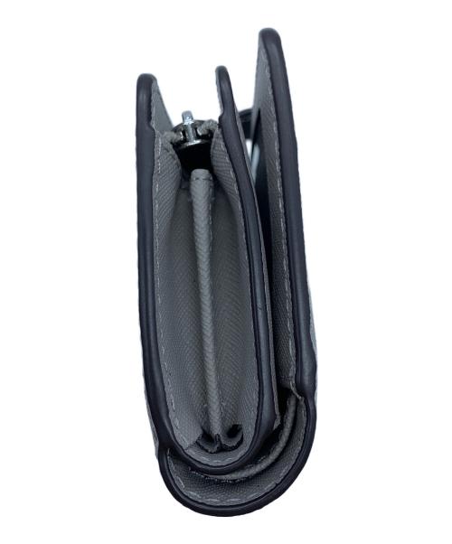 MICHAEL KORS（マイケル・コース）MICHAEL KORS (マイケル・コース) 2つ折り財布 グレーの古着・服飾アイテム