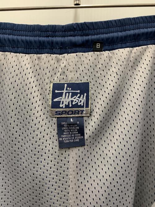 stussy sport（ステューシー スポーツ）stussy SPORT (ステューシー スポーツ) ナイロンリフレクターパンツ ネイビー サイズ:Lの古着・服飾アイテム