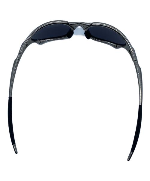 OAKLEY（オークリー）OAKLEY (オークリー) サングラス　Penny polished シルバー×ブラックの古着・服飾アイテム