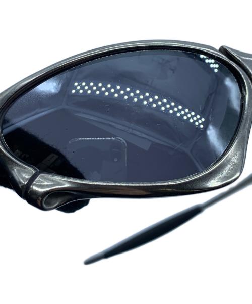 OAKLEY（オークリー）OAKLEY (オークリー) サングラス　Penny polished シルバー×ブラックの古着・服飾アイテム