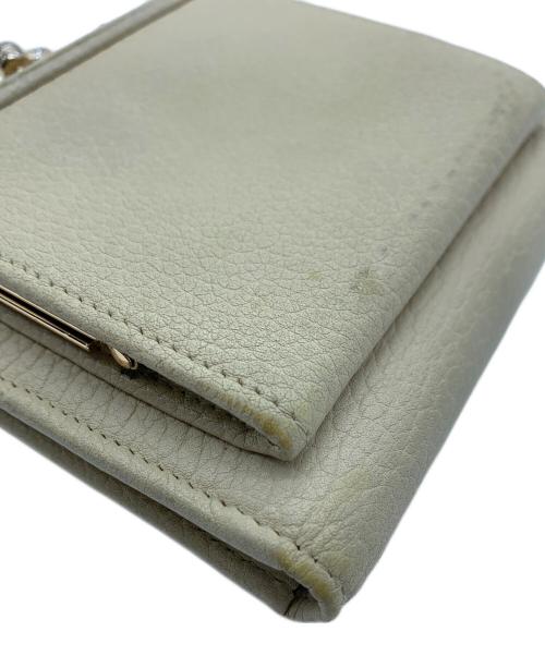 DOONEY&BOURKE（ドゥーニーアンドバーク）DOONEY&BOURKE (ドゥーニーアンドバーク) 2つ折り財布 ブラウン×ベージュの古着・服飾アイテム
