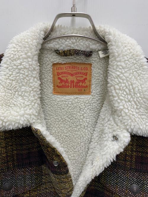 LEVI'S（リーバイス）LEVI'S (リーバイス) シェルパ トラッカージャケット イエロー×ブラウン サイズ:Lの古着・服飾アイテム
