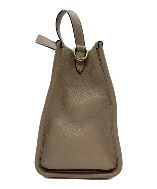 COACH（コーチ）COACH (コーチ) 2WAYバッグ　デンプシーキャリーオール ベージュの古着・服飾アイテム