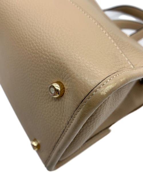 COACH（コーチ）COACH (コーチ) 2WAYバッグ　デンプシーキャリーオール ベージュの古着・服飾アイテム