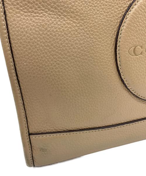 COACH（コーチ）COACH (コーチ) 2WAYバッグ　デンプシーキャリーオール ベージュの古着・服飾アイテム
