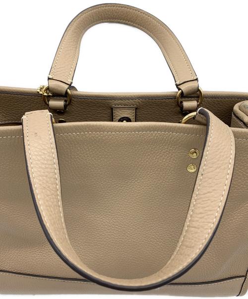 COACH（コーチ）COACH (コーチ) 2WAYバッグ　デンプシーキャリーオール ベージュの古着・服飾アイテム