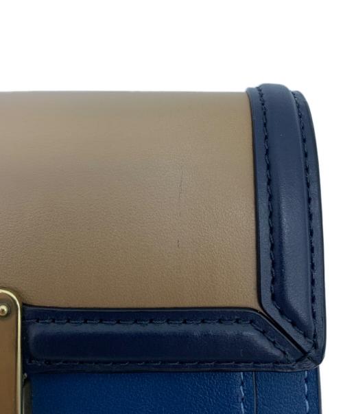 COACH（コーチ）COACH (コーチ) ハットンウォレット スカイブルー×オレンジの古着・服飾アイテム