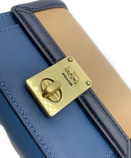 COACH（コーチ）COACH (コーチ) ハットンウォレット スカイブルー×オレンジの古着・服飾アイテム