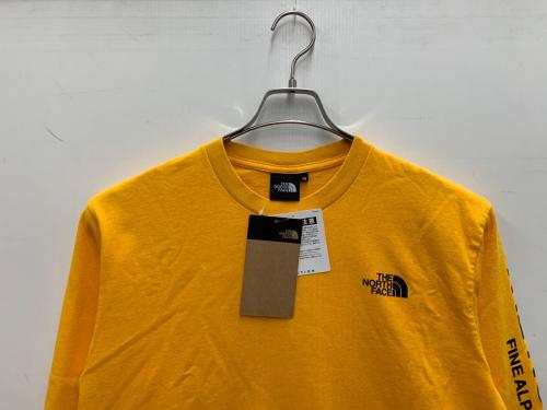 THE NORTH FACE（ザ ノース フェイス）THE NORTH FACE (ザ ノース フェイス) 長袖カットソー オレンジ サイズ:M 未使用品の古着・服飾アイテム