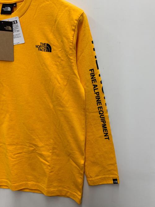 THE NORTH FACE（ザ ノース フェイス）THE NORTH FACE (ザ ノース フェイス) 長袖カットソー オレンジ サイズ:M 未使用品の古着・服飾アイテム