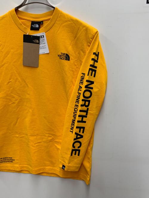 THE NORTH FACE（ザ ノース フェイス）THE NORTH FACE (ザ ノース フェイス) 長袖カットソー オレンジ サイズ:M 未使用品の古着・服飾アイテム