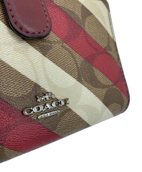 COACH（コーチ）COACH (コーチ) 2つ折り財布 レッド×ベージュの古着・服飾アイテム