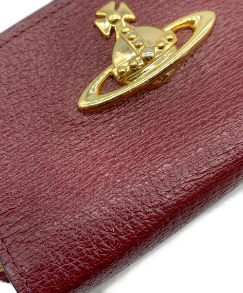 Vivienne Westwood（ヴィヴィアンウエストウッド）Vivienne Westwood (ヴィヴィアンウエストウッド) マルチポーチ ブラウン×ゴールドの古着・服飾アイテム