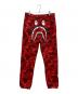 A BATHING APE（アベイシングエイプ）の古着「シャークスウェットパンツ」｜レッド