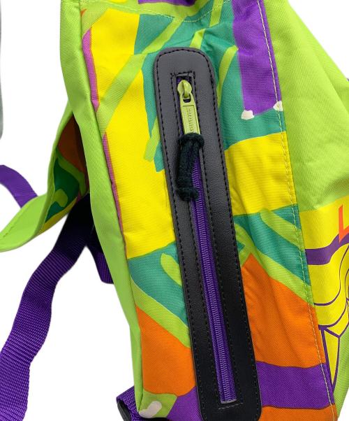 SALOMON（サロモン）SALOMON (サロモン) リュック イエロー×オレンジの古着・服飾アイテム