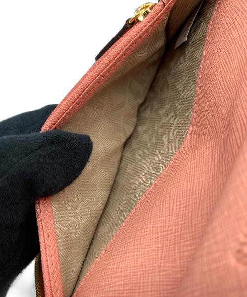 MICHAEL KORS（マイケルコース）MICHAEL KORS (マイケルコース) 長財布 ピンクの古着・服飾アイテム