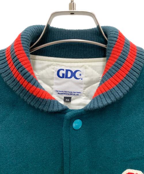 GDC（ジーディーシー）GDC (ジーディーシー) スタジャン グリーン×ベージュ サイズ:Mの古着・服飾アイテム