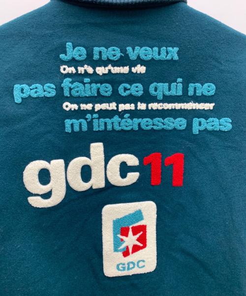 GDC（ジーディーシー）GDC (ジーディーシー) スタジャン グリーン×ベージュ サイズ:Mの古着・服飾アイテム