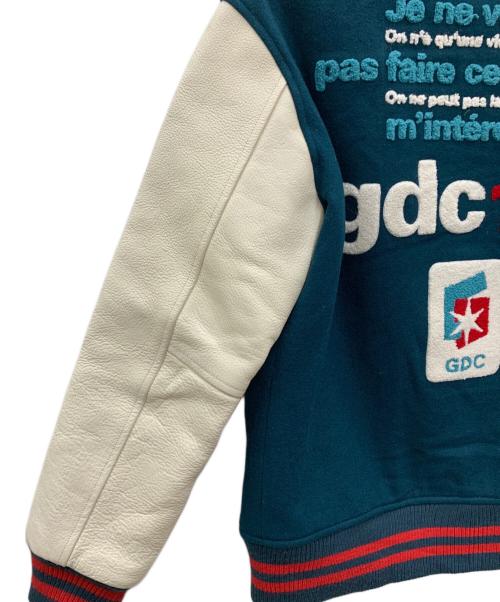 GDC（ジーディーシー）GDC (ジーディーシー) スタジャン グリーン×ベージュ サイズ:Mの古着・服飾アイテム