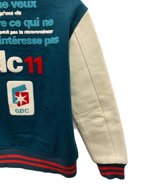 GDC（ジーディーシー）GDC (ジーディーシー) スタジャン グリーン×ベージュ サイズ:Mの古着・服飾アイテム