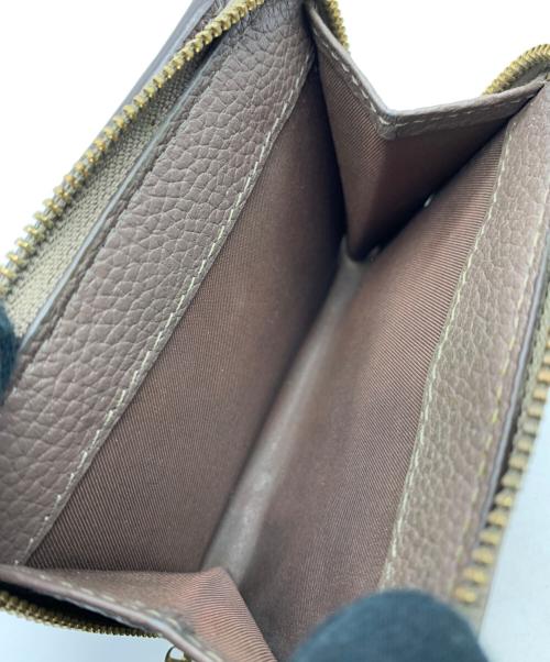 TORY BURCH（トリーバーチ）TORY BURCH (トリーバーチ) 2つ折り財布 グレーの古着・服飾アイテム