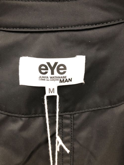 eYe COMME des GARCONS JUNYAWATANABE MAN（アイ コム デ ギャルソン ジュンヤ ワタナベ マン）eYe COMME des GARCONS JUNYAWATANABE MAN (アイ コム デ ギャルソン ジュンヤ ワタナベ マン) エステルツイルトレンチコート ブラック サイズ:SIZE Mの古着・服飾アイテム