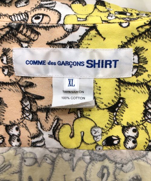 COMME des GARCONS SHIRT（コムデギャルソンシャツ）COMME des GARCONS SHIRT (コムデギャルソンシャツ) KAWS (カウズ) 長袖シャツ イエロー サイズ:XLの古着・服飾アイテム