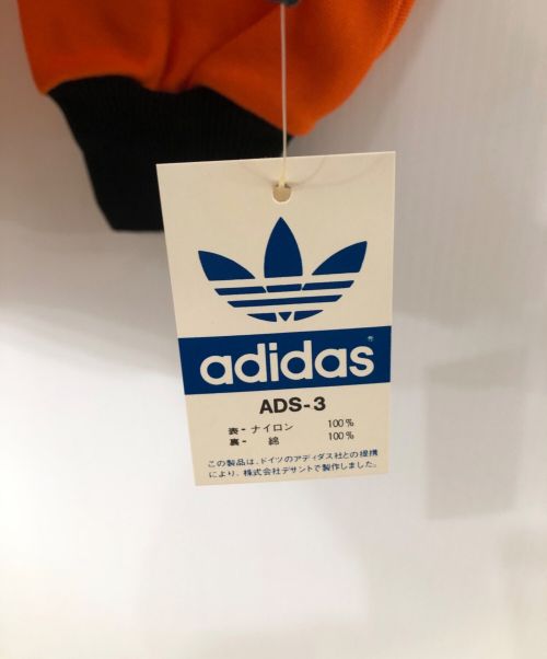 adidas（アディダス）adidas (アディダス) DESCENTE/W.GERMANY VINTAGE TRACK JKT　箱付き オレンジ×ブラック サイズ:3の古着・服飾アイテム