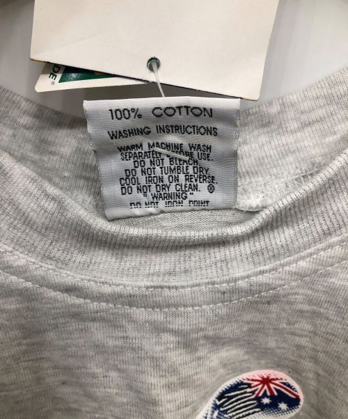 OLYMPIC AUTHENTICS COLLECTION（オリンピック）OLYMPIC AUTHENTICS COLLECTION (オリンピック) OLYMPIC AUTHENTICS COLLECTION　2000Sydney カットソー グレー サイズ:SIZE Sの古着・服飾アイテム