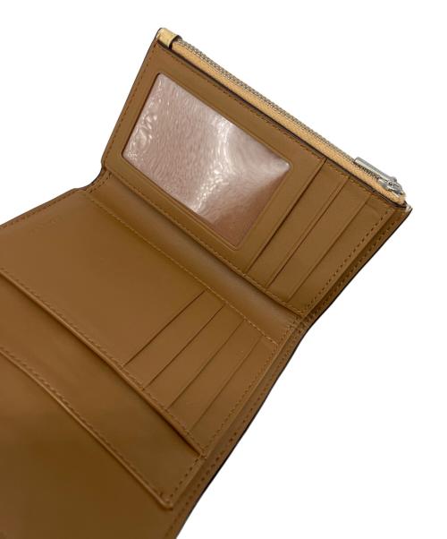 COACH（コーチ）COACH (コーチ) 3つ折り財布 クリームの古着・服飾アイテム