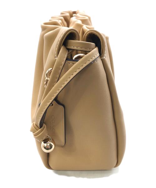 COACH（コーチ）COACH (コーチ) フェイ ドローストリングバッグ／FAYE DRAW STRING BAG ベージュの古着・服飾アイテム