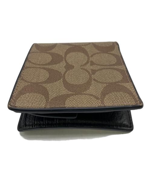 COACH（コーチ）COACH (コーチ) 2つ折り財布 ベージュの古着・服飾アイテム