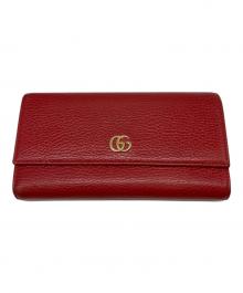 GUCCI（グッチ）の古着「長財布」｜レッド×ゴールド