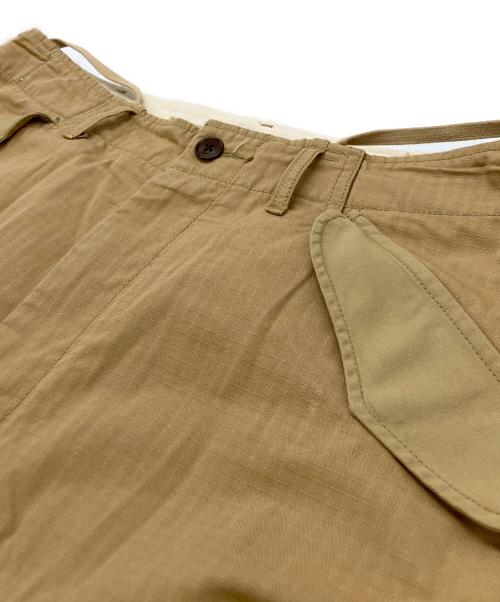 nanamica（ナナミカ）nanamica (ナナミカ) カーゴパンツ ベージュ サイズ:86cm(W34)の古着・服飾アイテム