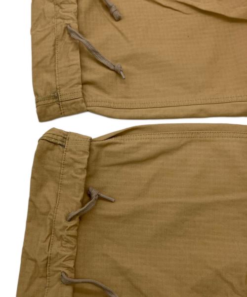nanamica（ナナミカ）nanamica (ナナミカ) カーゴパンツ ベージュ サイズ:86cm(W34)の古着・服飾アイテム