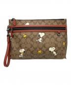 COACH×PEANUTSコーチ×ピーナッツ）の古着「クラッチバッグ」｜ベージュ