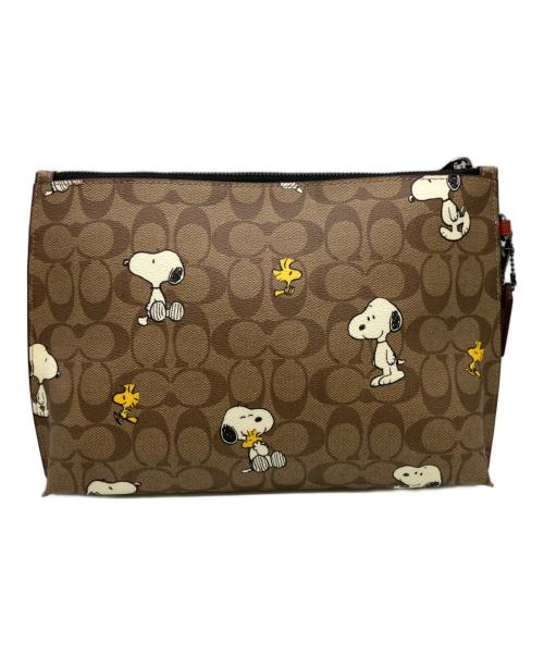 COACH（コーチ）COACH (コーチ) PEANUTS (ピーナッツ) クラッチバッグ ベージュの古着・服飾アイテム