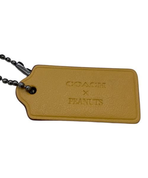 COACH（コーチ）COACH (コーチ) PEANUTS (ピーナッツ) クラッチバッグ ベージュの古着・服飾アイテム