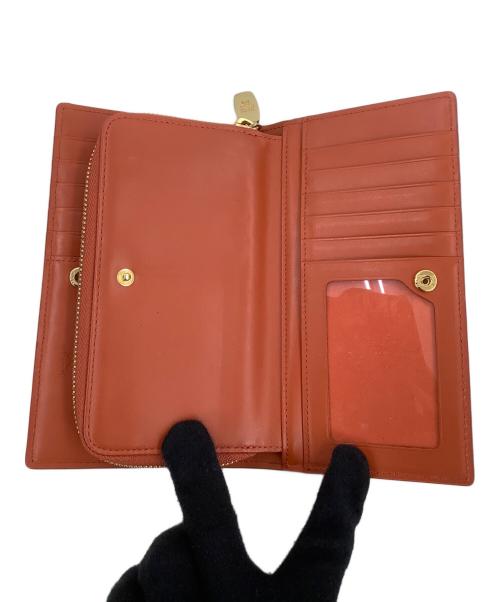 MCM（エムシーエム）MCM (エムシーエム) 長財布 オレンジの古着・服飾アイテム